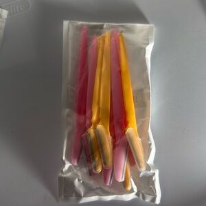 10 pcs pink and yellow facial razors
